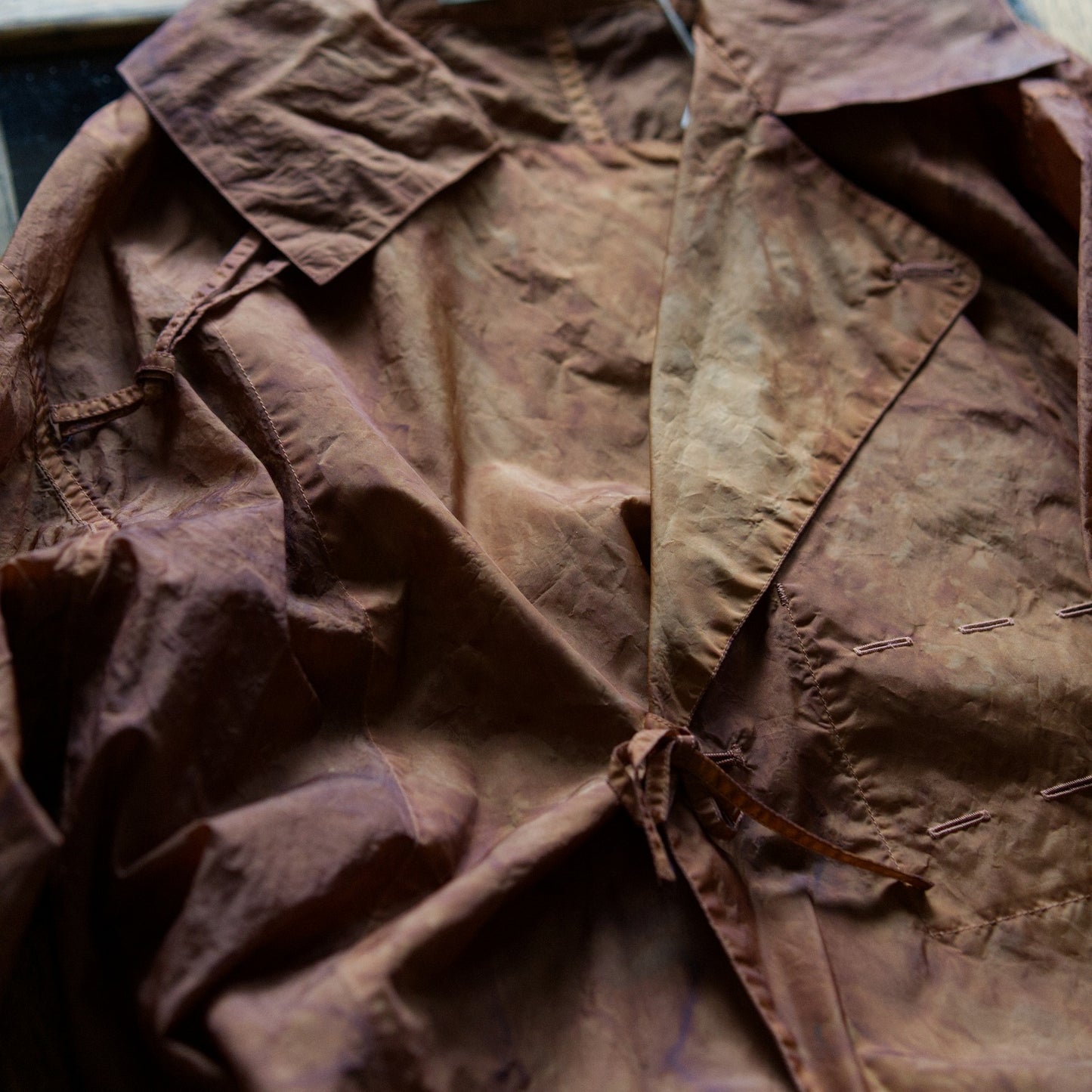 assimilate plants coat - aging traditional cloth