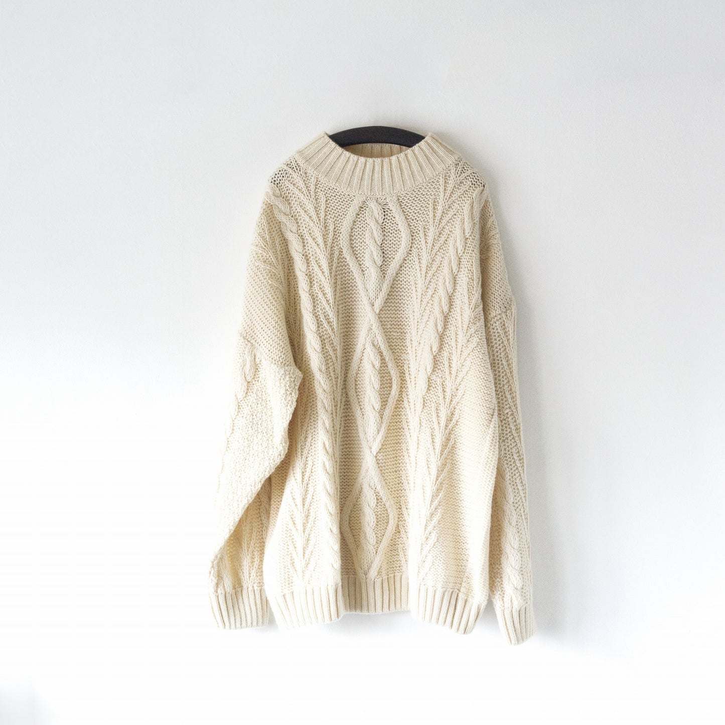 White cable knit sweater